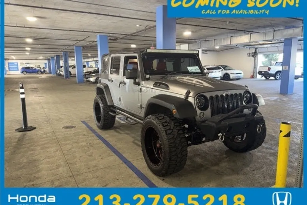 2014 Jeep Wrangler Unlimited Sport photo 1