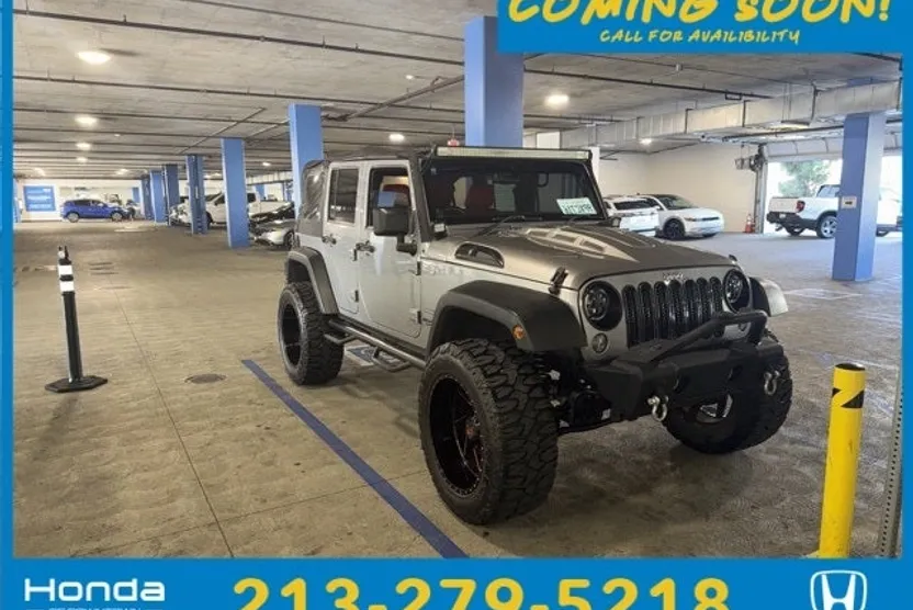 2014 Jeep Wrangler Unlimited Sport photo 1