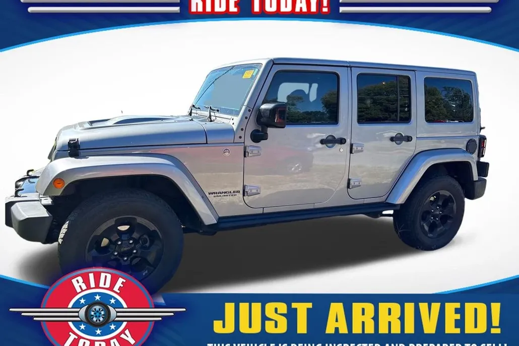 2015 Jeep Wrangler Unlimited Sahara High Altitude photo 1