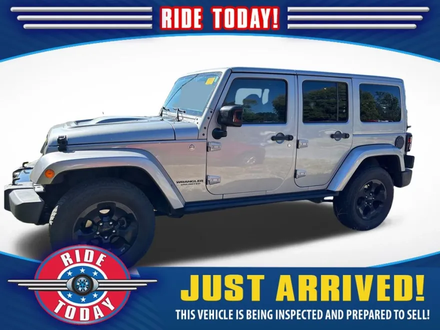 2015 Jeep Wrangler Unlimited Sahara High Altitude photo 1