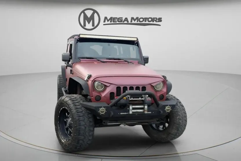 2012 Jeep Wrangler Unlimited Sahara Sport photo 1