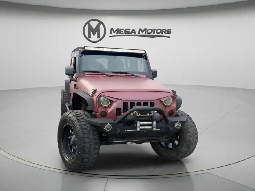 2012 Jeep Wrangler Unlimited Sahara Sport photo 1