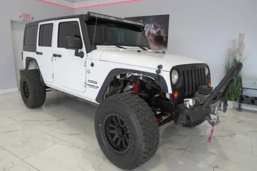2013 Jeep Wrangler Unlimited Sport photo 1