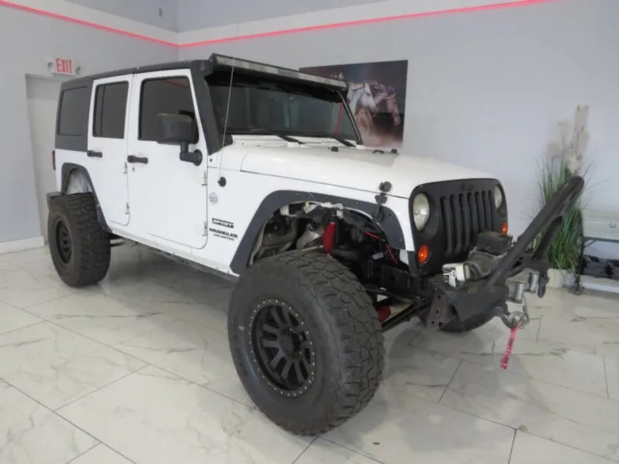 2013 Jeep Wrangler Unlimited Sport photo 1