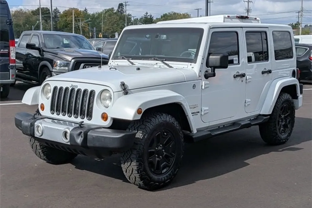 2013 Jeep Wrangler Unlimited Sahara photo 1