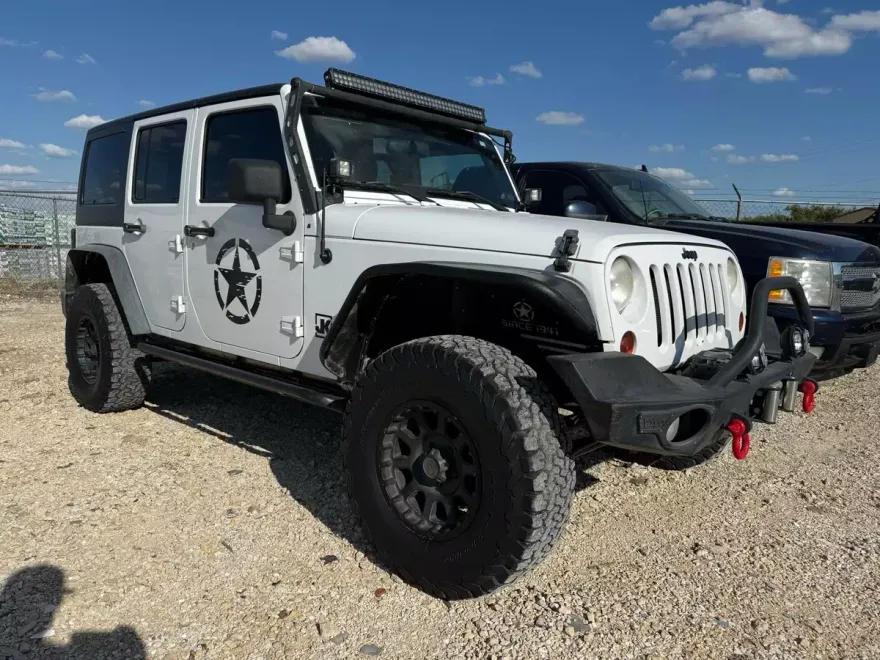 2012 Jeep Wrangler Unlimited Sport photo 1