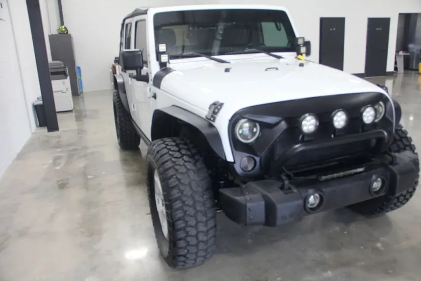 2014 Jeep Wrangler Unlimited Sahara Sport photo 1