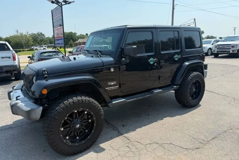 2015 Jeep Wrangler Unlimited Sahara Sport photo 1
