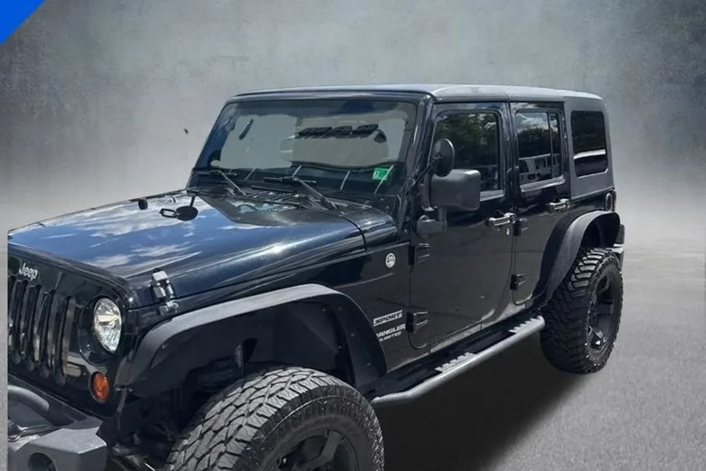 2013 Jeep Wrangler Unlimited Sport photo 1