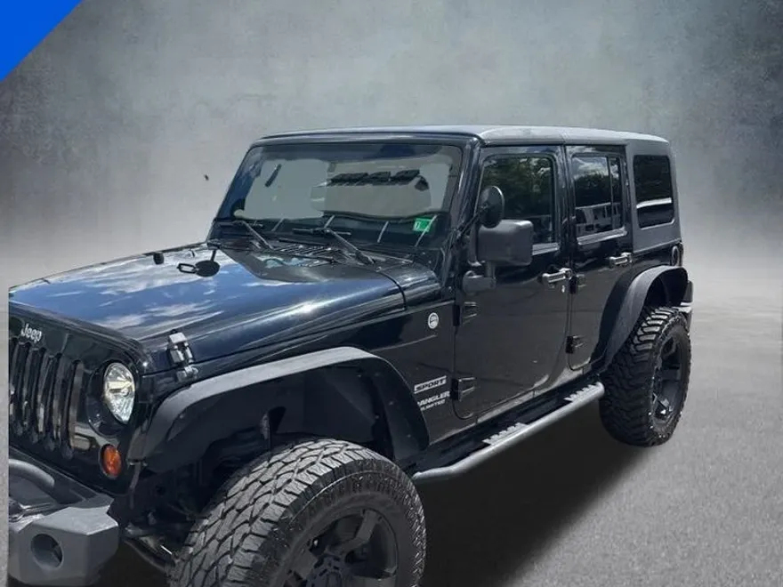 2013 Jeep Wrangler Unlimited Sport photo 1