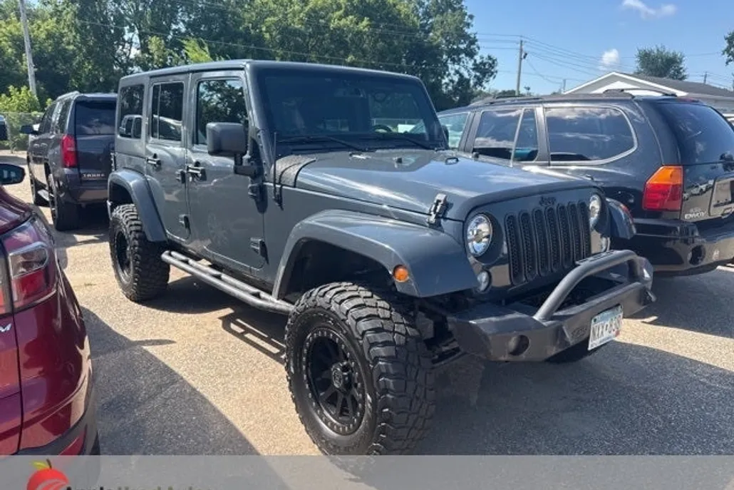 2016 Jeep Wrangler Unlimited Sahara photo 1