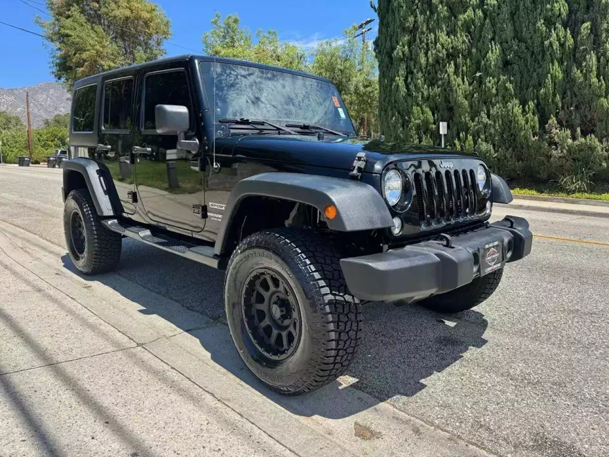 2014 Jeep Wrangler Unlimited Sport photo 1