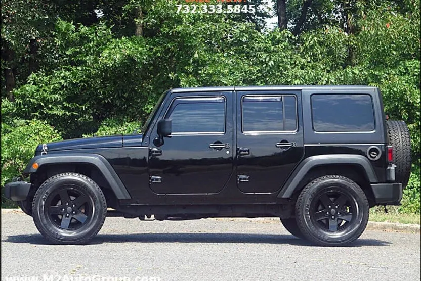 2013 Jeep Wrangler Unlimited Sport photo 1