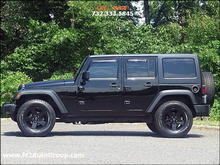 2013 Jeep Wrangler Unlimited Sport photo 1