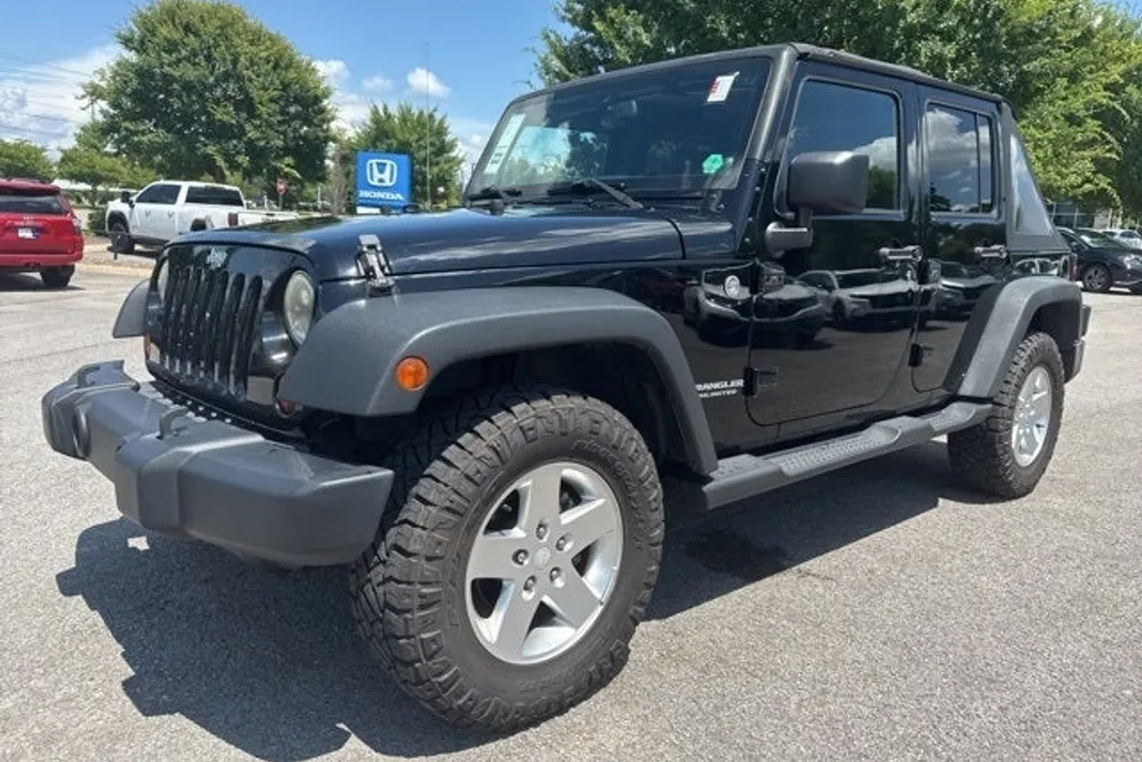 2013 Jeep Wrangler Unlimited Sport photo 1