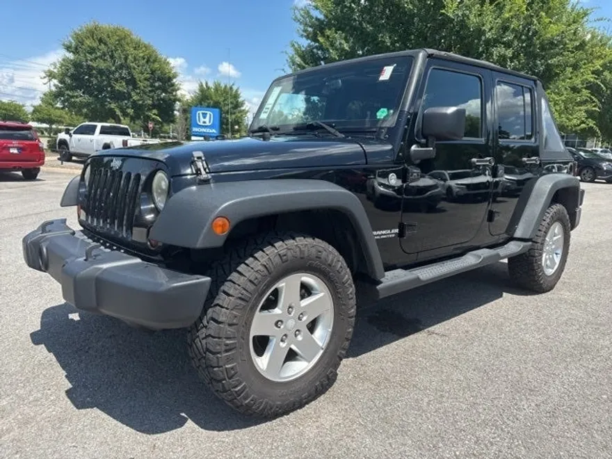 2013 Jeep Wrangler Unlimited Sport photo 1