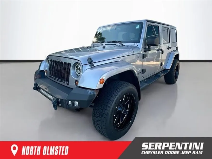 2013 Jeep Wrangler Unlimited Sahara photo 1