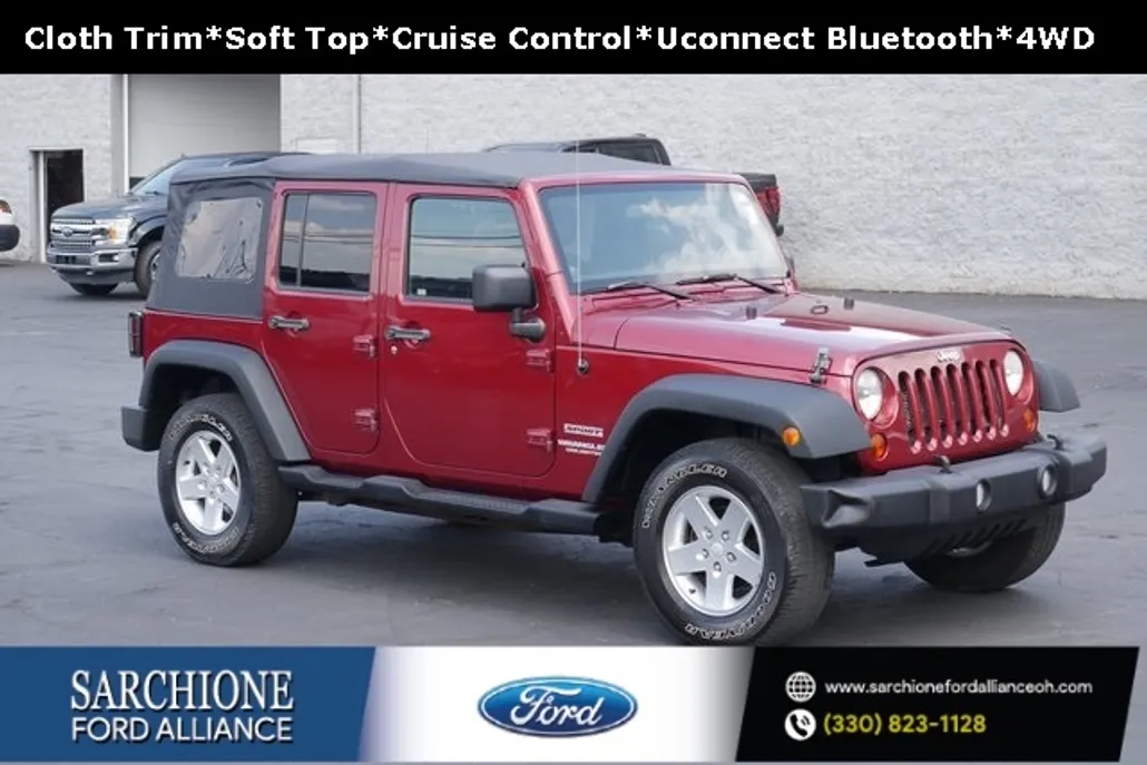 2013 Jeep Wrangler Unlimited Sport photo 1