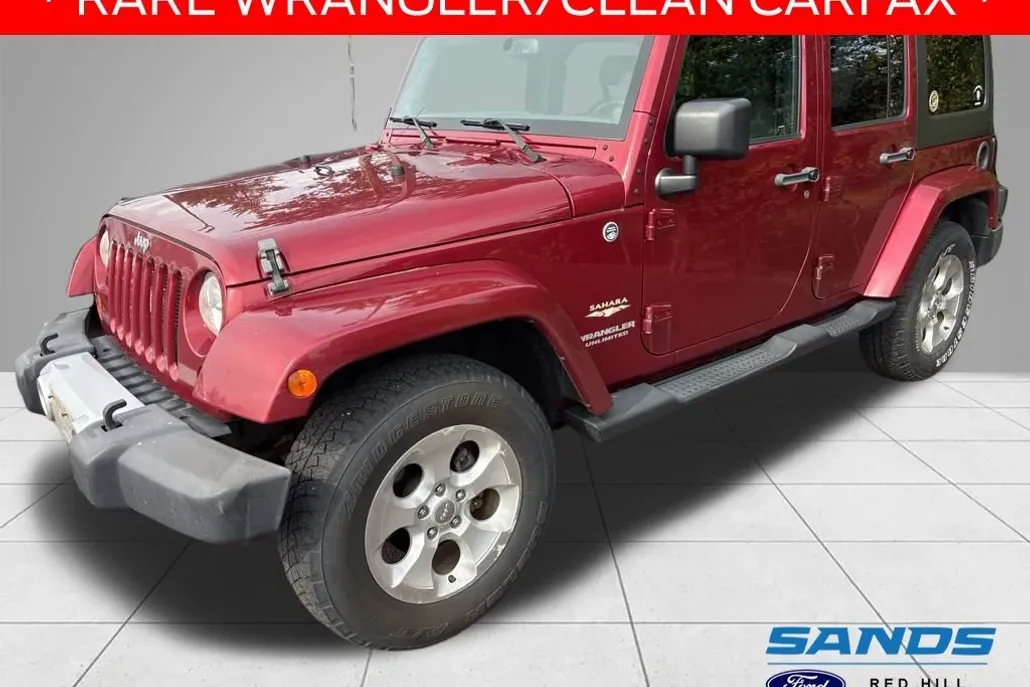 2013 Jeep Wrangler Unlimited Sahara photo 1