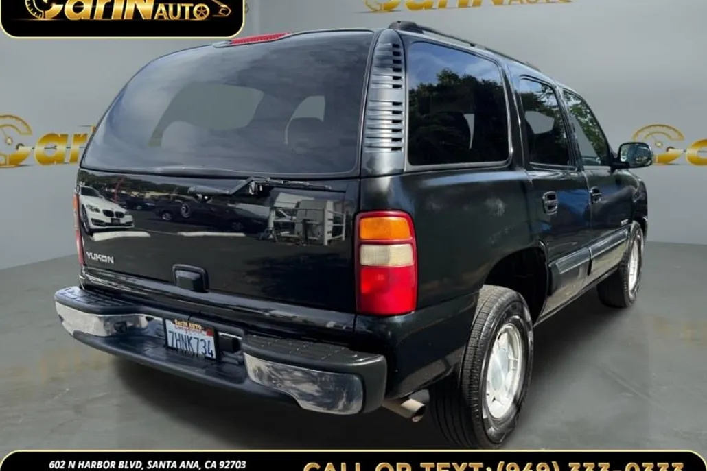 2003 Gmc Yukon 1500 SLE photo 1