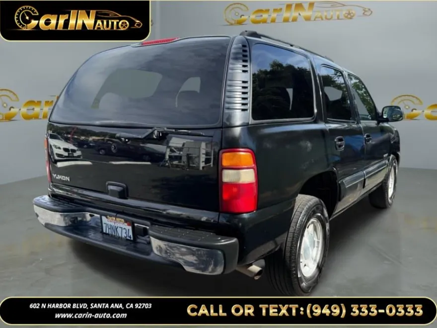 2003 Gmc Yukon 1500 SLE photo 1