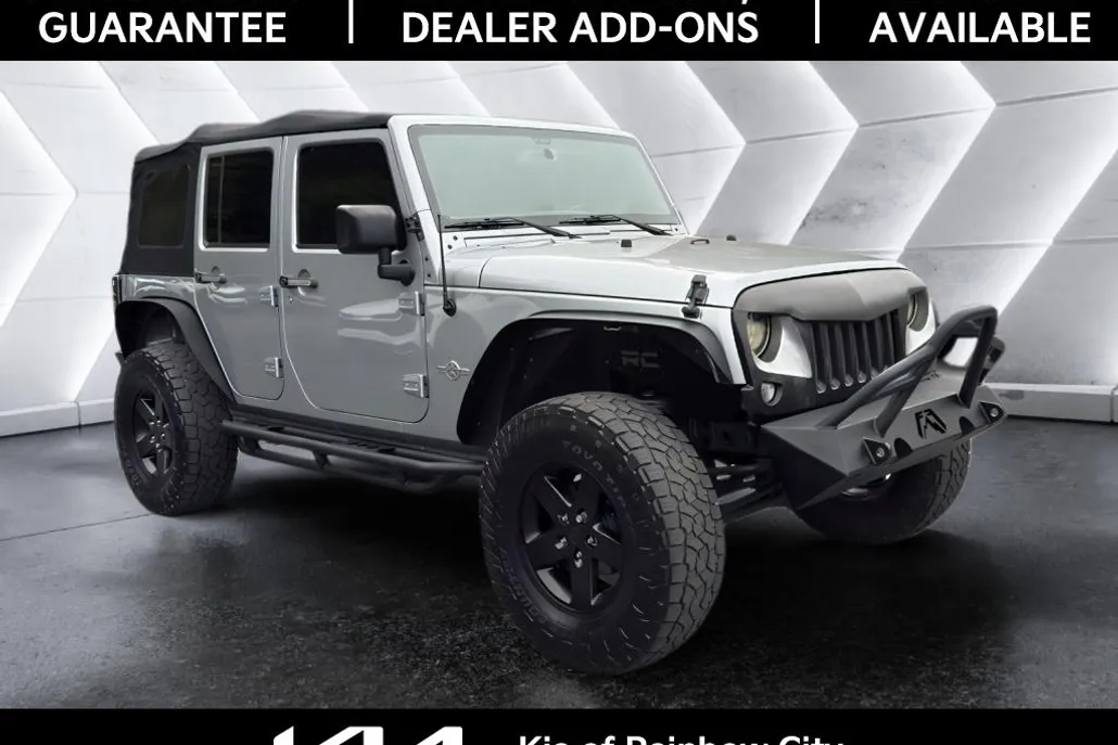 2015 Jeep Wrangler Unlimited Freedom Sport photo 1