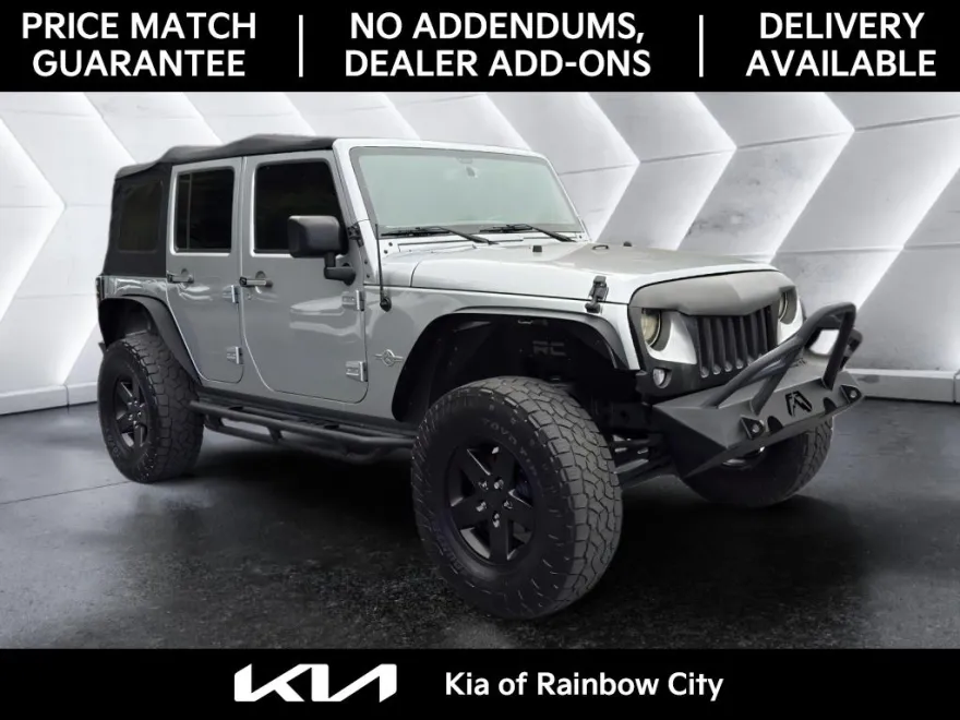 2015 Jeep Wrangler Unlimited Freedom Sport photo 1