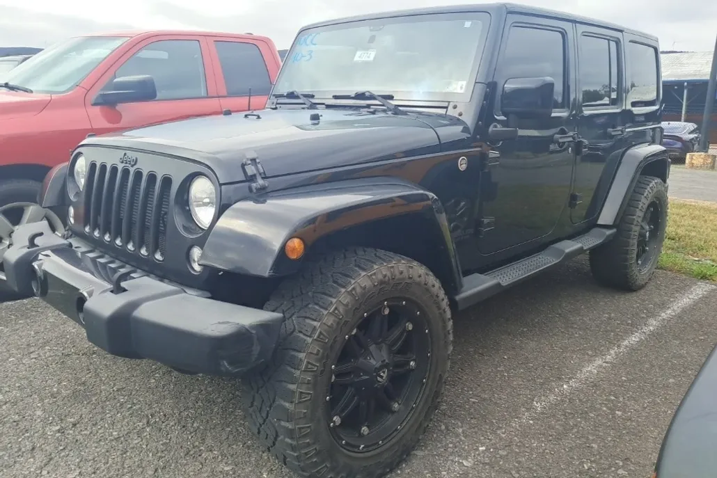 2014 Jeep Wrangler Unlimited Altitude photo 1