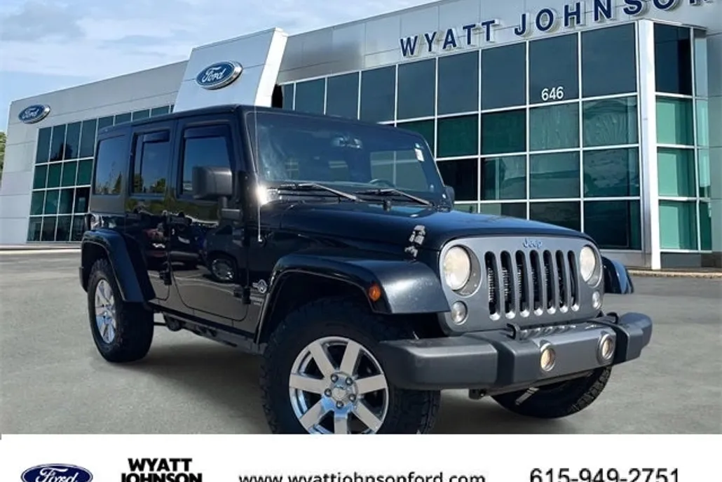 2014 Jeep Wrangler Unlimited Freedom photo 1