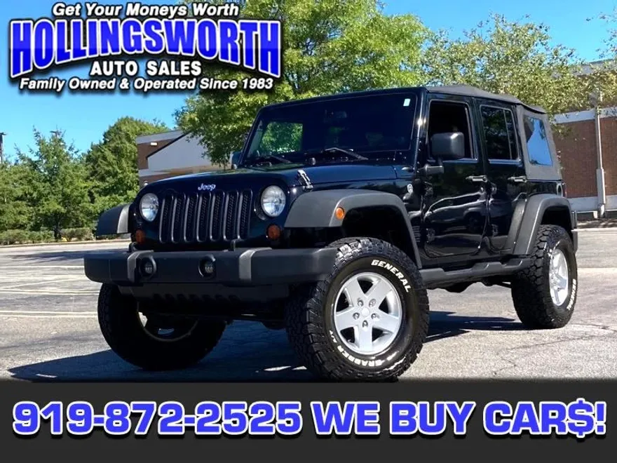 2013 Jeep Wrangler Unlimited Sport photo 1
