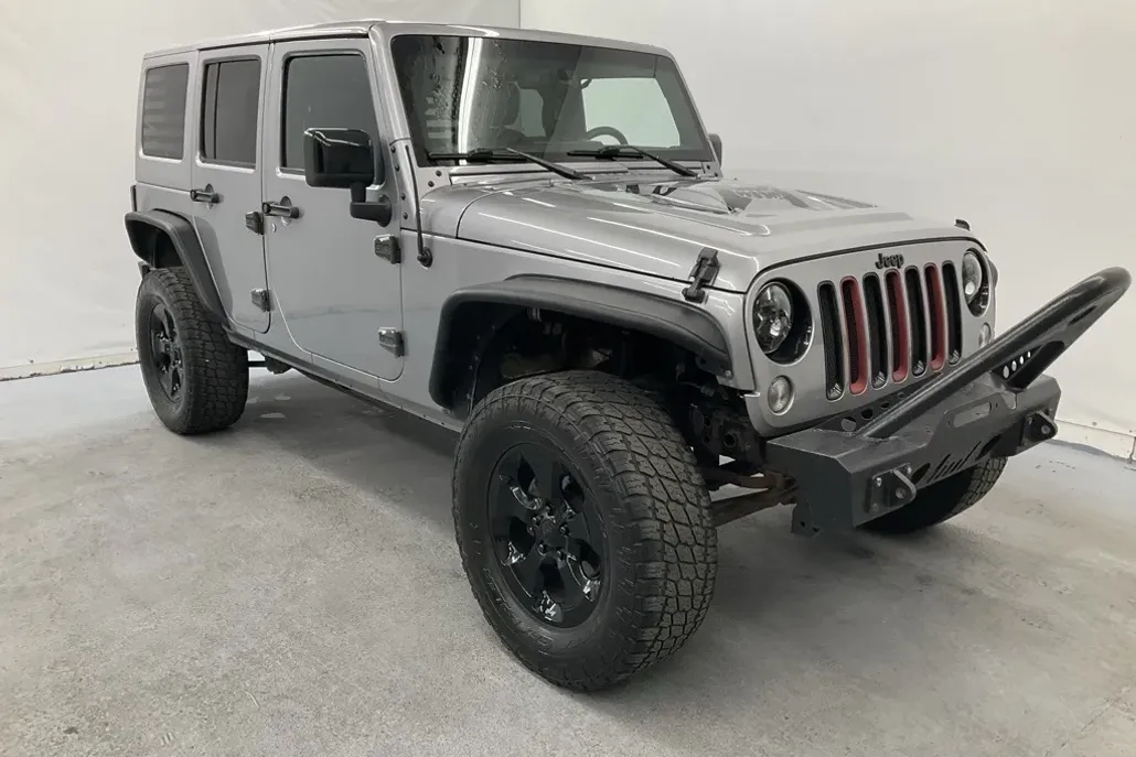 2015 Jeep Wrangler Unlimited Sahara Altitude photo 1