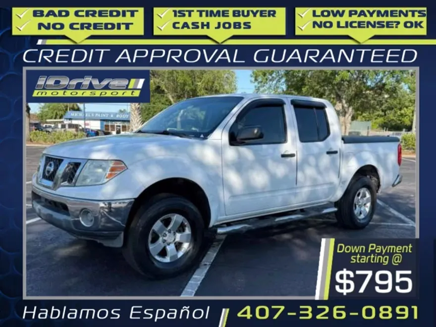 2010 Nissan Frontier Crew Cab LE photo 1