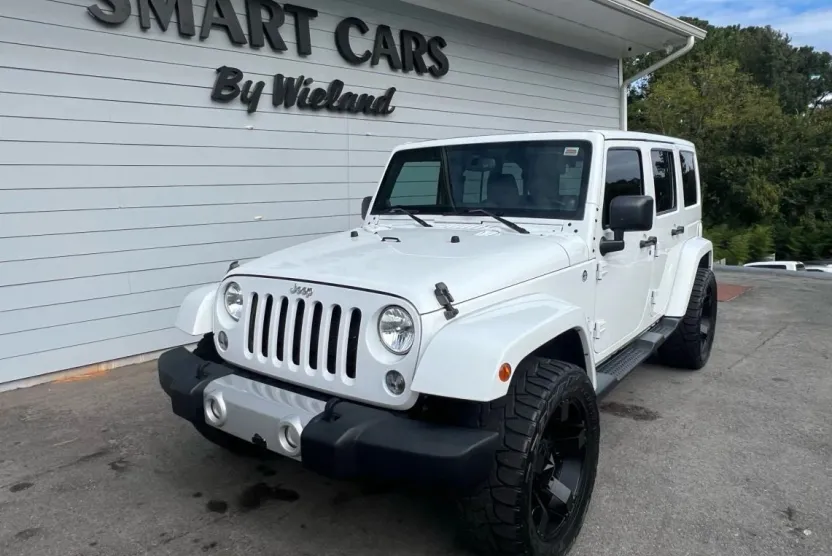 2014 Jeep Wrangler Unlimited Sahara Sport photo 1