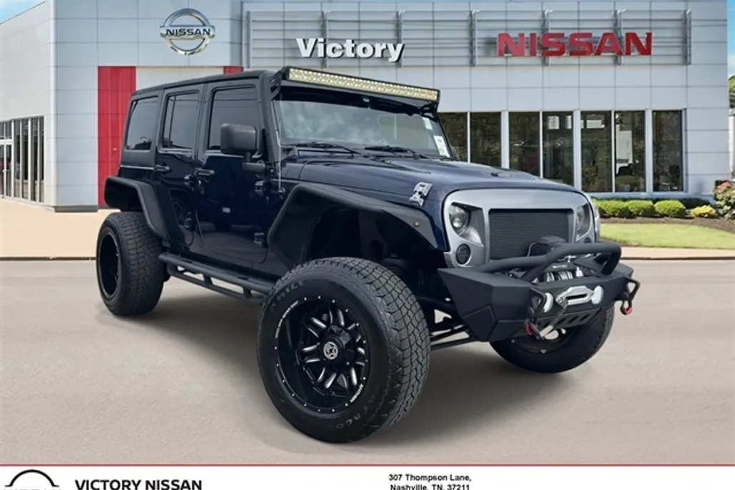 2013 Jeep Wrangler Unlimited Freedom photo 1