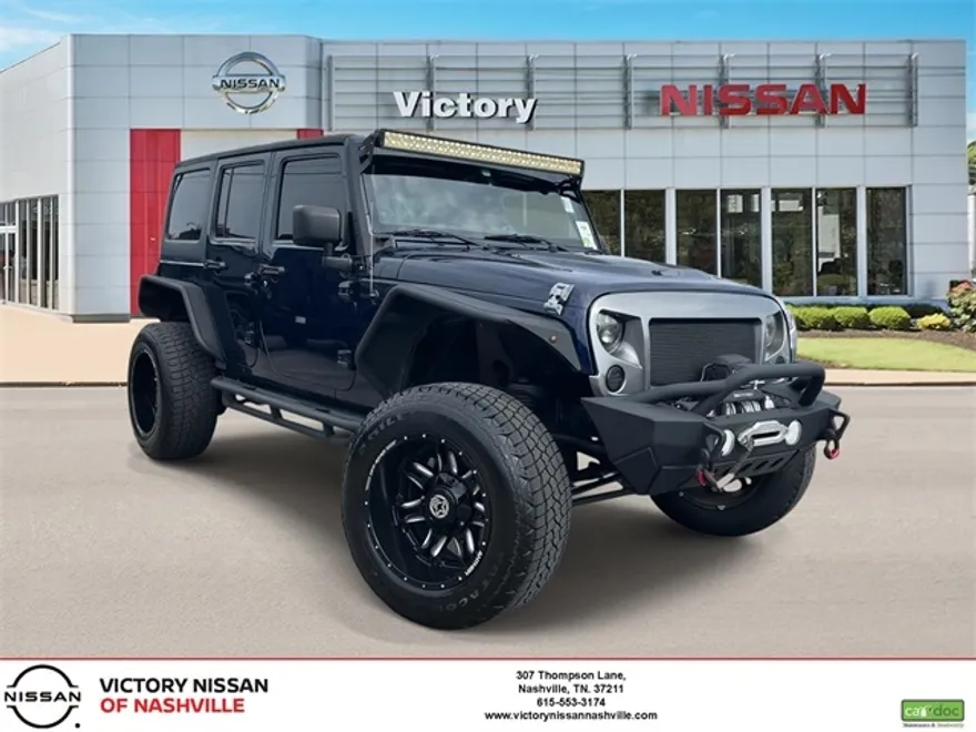 2013 Jeep Wrangler Unlimited Freedom photo 1