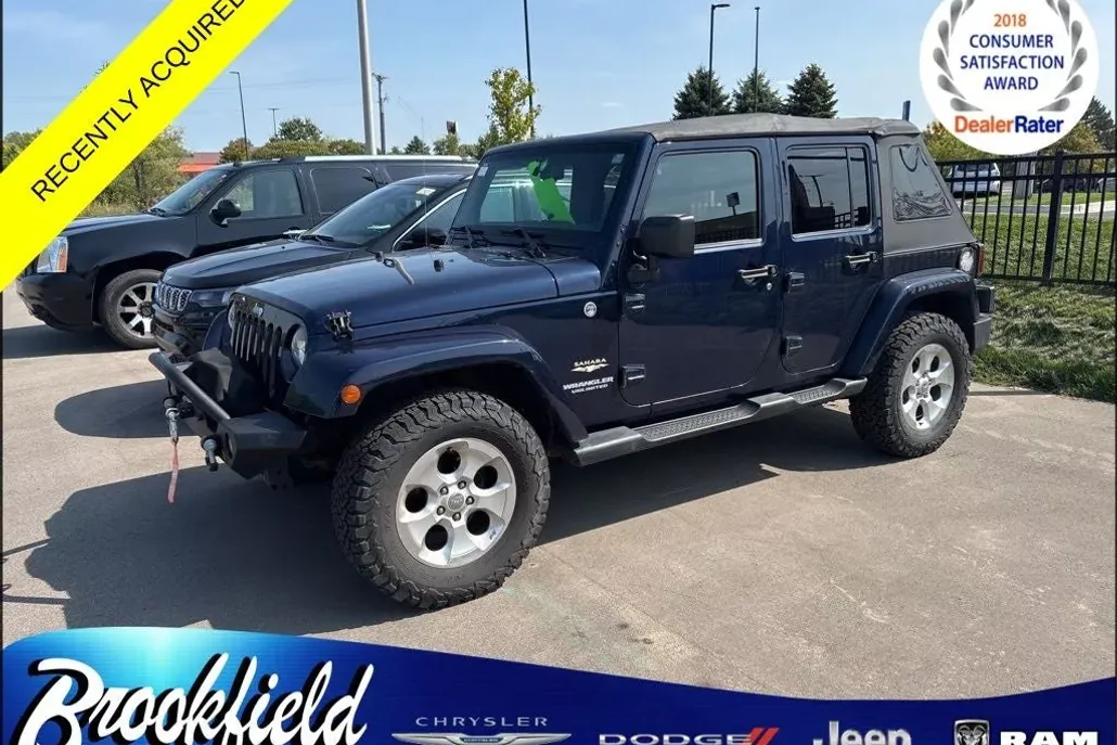 2013 Jeep Wrangler Unlimited Sahara photo 1