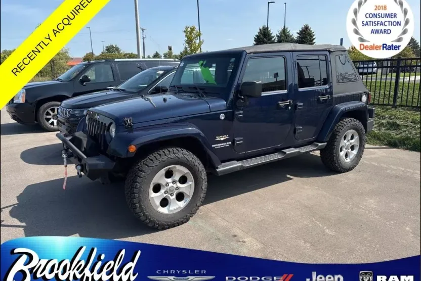 2013 Jeep Wrangler Unlimited Sahara photo 1