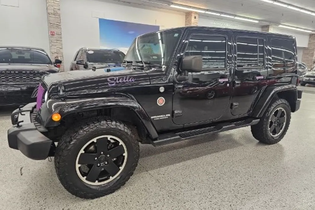2012 Jeep Wrangler Unlimited Sahara Altitude photo 1