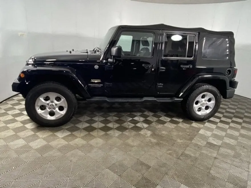 2014 Jeep Wrangler Unlimited Sahara photo 1