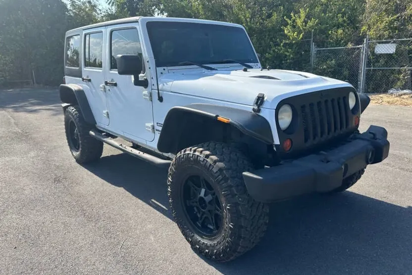 2013 Jeep Wrangler Unlimited Sport photo 1