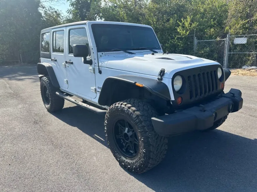 2013 Jeep Wrangler Unlimited Sport photo 1