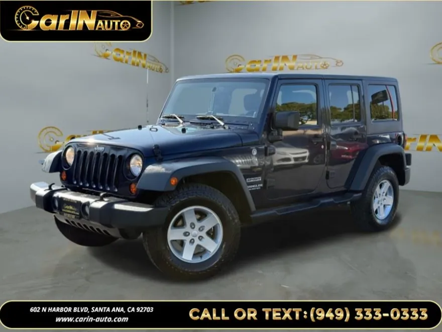 2013 Jeep Wrangler Unlimited Sport photo 1