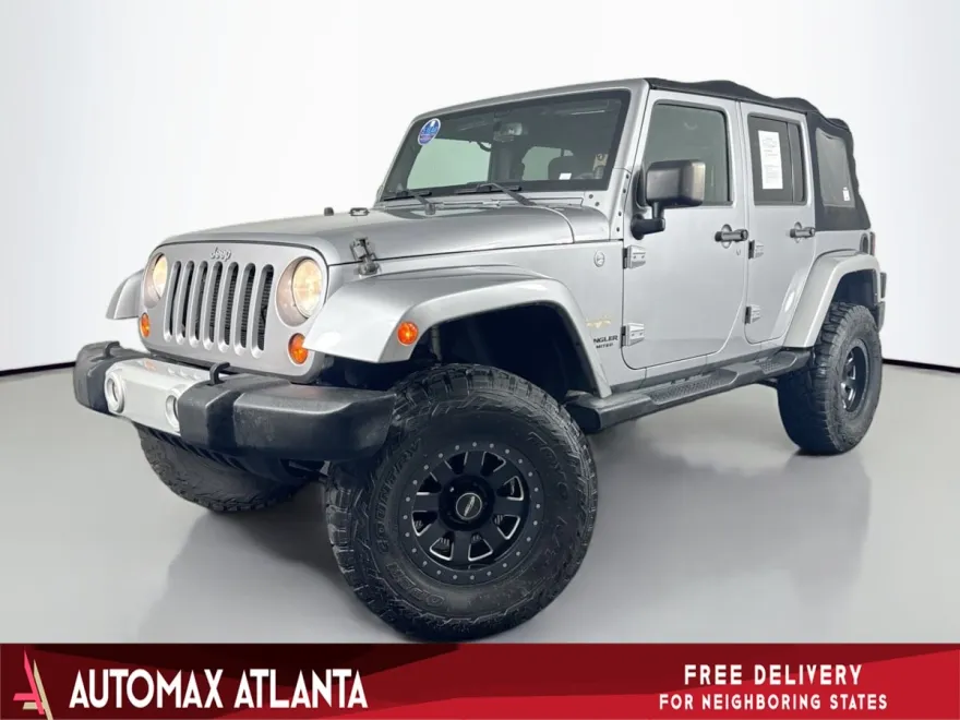 2013 Jeep Wrangler Unlimited Sahara photo 1