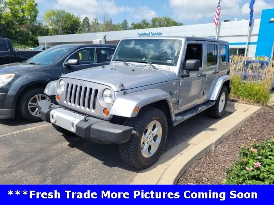 2013 Jeep Wrangler Unlimited Sahara photo 1