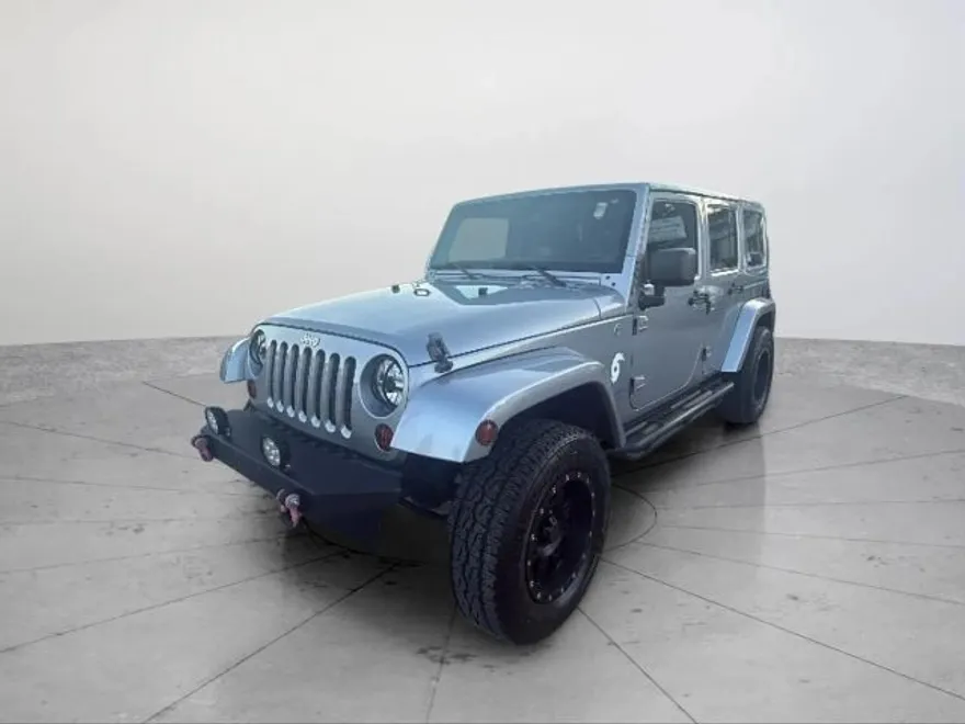 2013 Jeep Wrangler Unlimited Sahara Sport photo 1