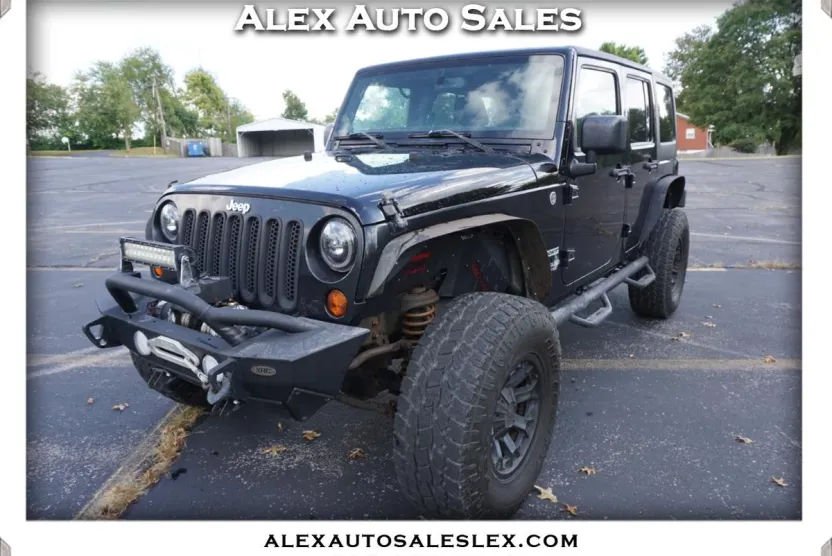 2013 Jeep Wrangler Unlimited Sport photo 1