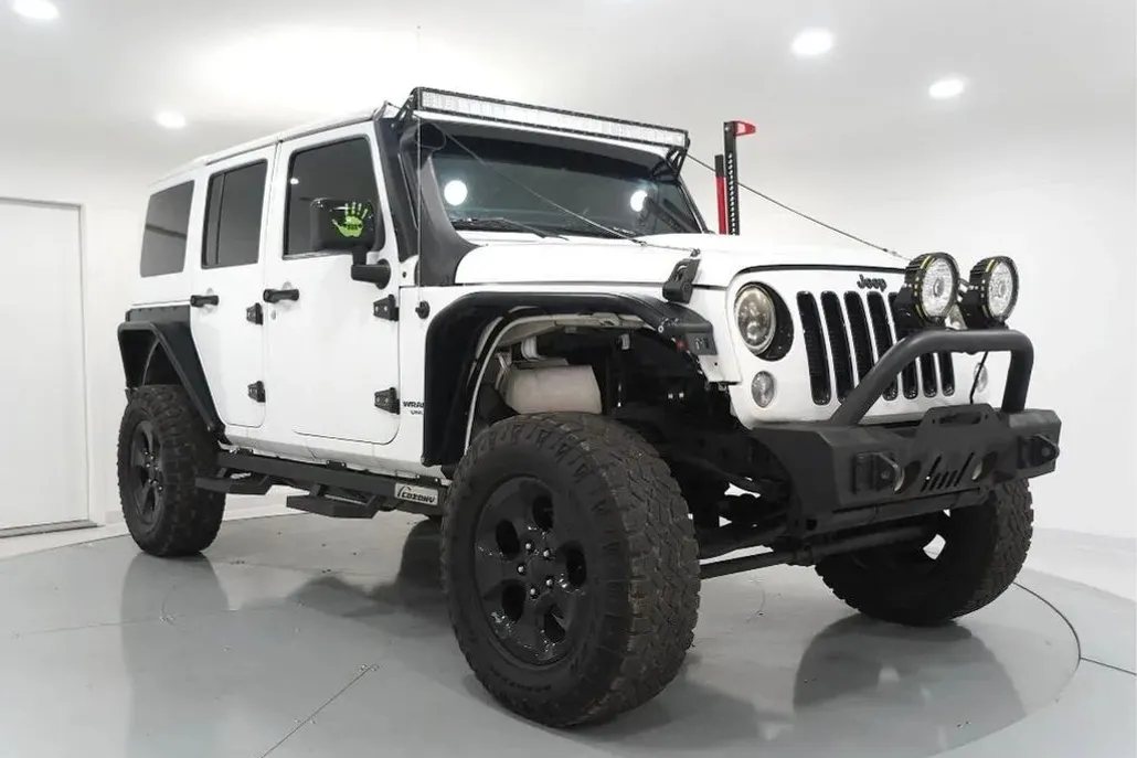 2015 Jeep Wrangler Unlimited Altitude Sport photo 1