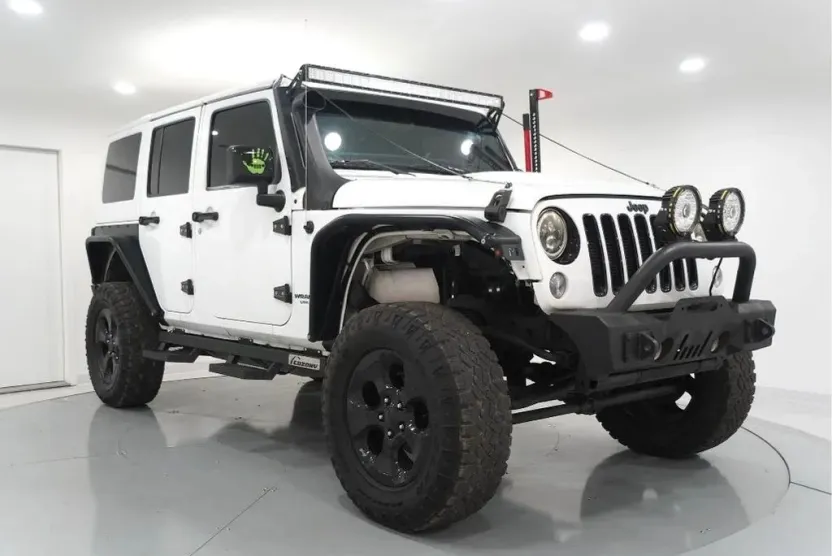 2015 Jeep Wrangler Unlimited Altitude Sport photo 1