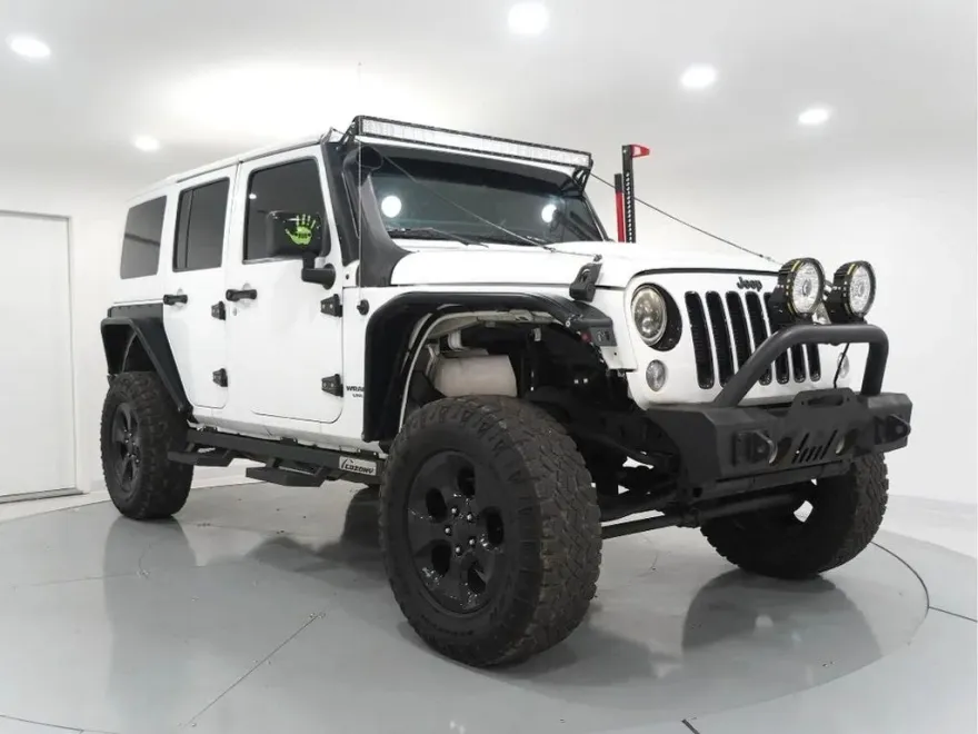 2015 Jeep Wrangler Unlimited Altitude Sport photo 1