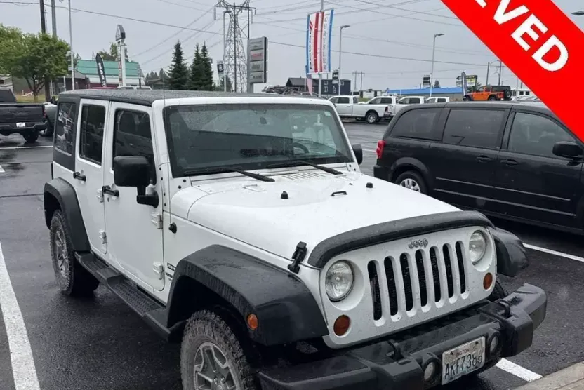 2013 Jeep Wrangler Unlimited Sport photo 1